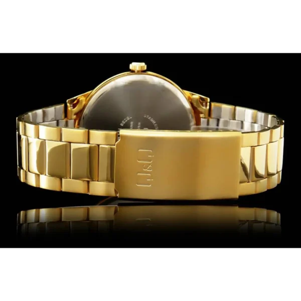 Vista trasera del reloj dorado mostrando el cierre y los detalles de la correa.