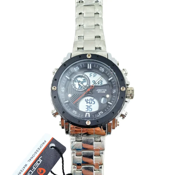 Reloj JOEFOX 1801G con correa metálica y doble hora, acompañado de su etiqueta de autenticidad.